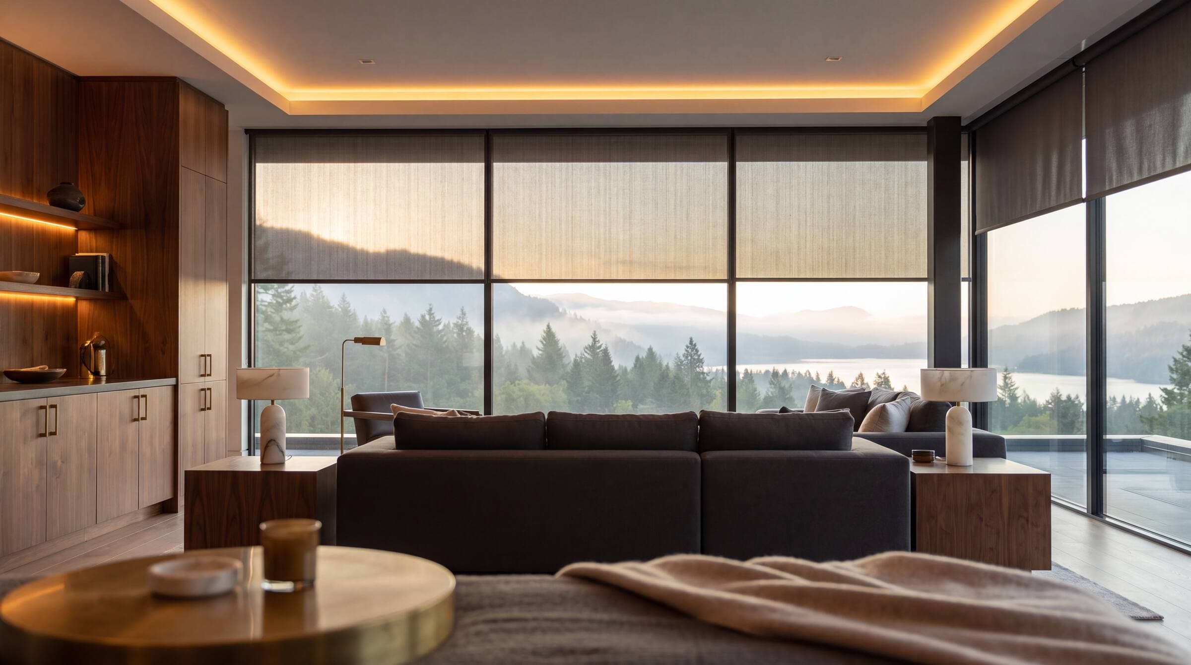 Floor-to-ceiling windows with motorized shades partly lowered and a view